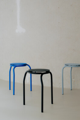 Stool in front concrete wall