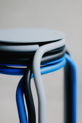 Stool in front concrete wall