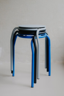 Stool in front concrete wall 