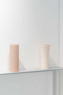 Exhibition showing two ceramic vases