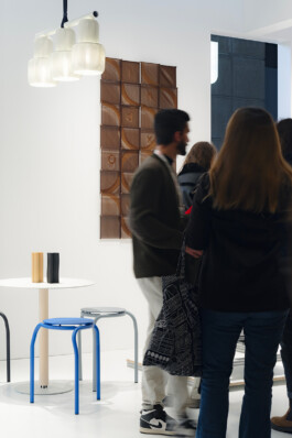 exhibition with people inside the booth